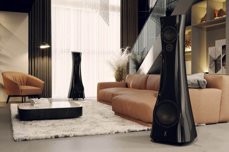 A pair of sculptural hi-fi speakers in a contemporary listening room